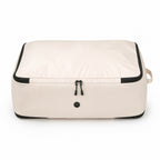 Down jacket storage bag with air vent in beige — front view